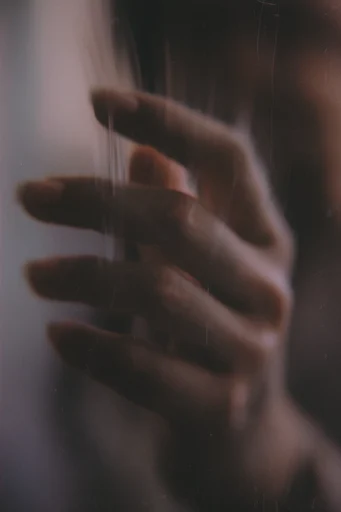 Ethereal Fragmented Melancholy style reference image — analog film grain
