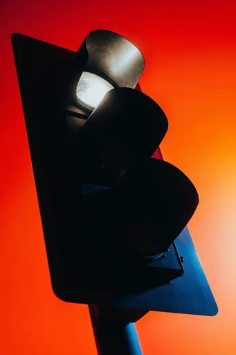 Cinematic Neon Noir style reference image — dramatic gel lighting