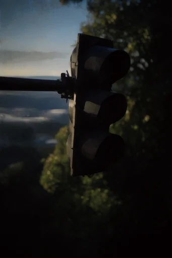 Cinematic Chiaroscuro Solitude style reference image — voyeuristic framing