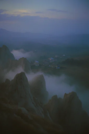Cinematic Hazy Melancholy style reference image — cinematic film grain