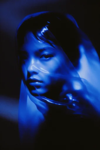 Luminescent Spectral Noir style reference image — spectral distortion