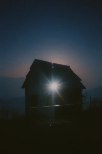 Cinematic Nocturnal Grain style reference image — minimalist silhouette