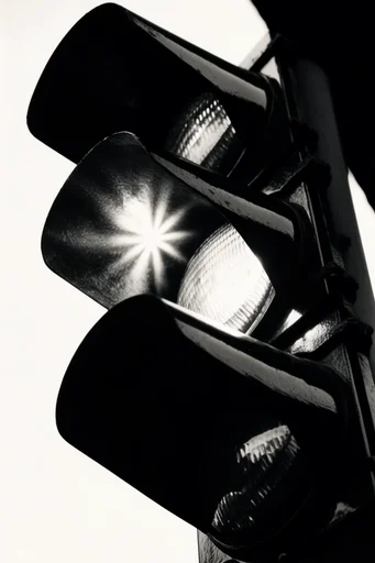 Visceral Monochromatic Noir style reference image — chiaroscuro lighting