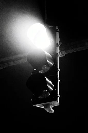 Experimental Analog Noir style reference image — analog film grain