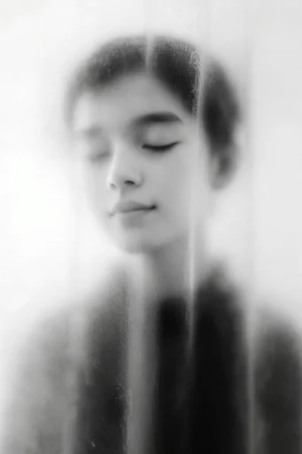 Ethereal Obscured Minimalism style reference image — cinematic motion blur