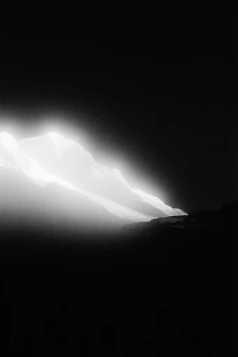 Ethereal Nocturnal Luminescence style reference image — high contrast black and white