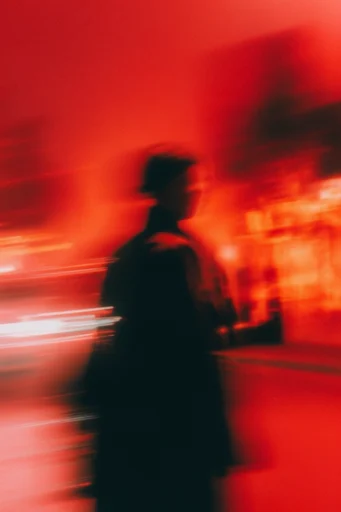 Crimson Nocturnal Blur style reference image — motion blur