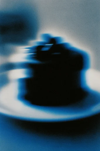 Nocturnal Analog Distortion style reference image — reeded glass refraction