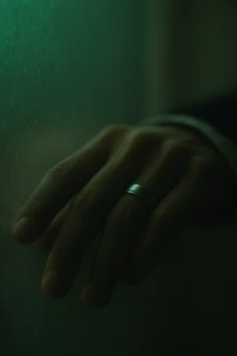 Cinematic Nocturnal Noir style reference image — moody monochromatic teal and emerald palette