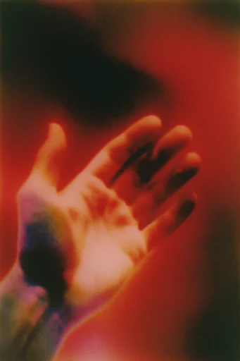 Crimson Noir Dreamscape style reference image — heavy analog film grain