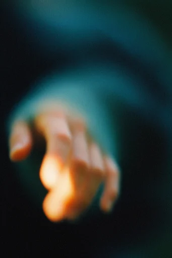 Cinematic Nocturnal Melancholy style reference image — soft focus bokeh
