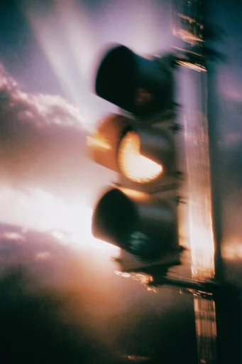 Ethereal Analog Nostalgia style reference image — warm amber and purple gradients