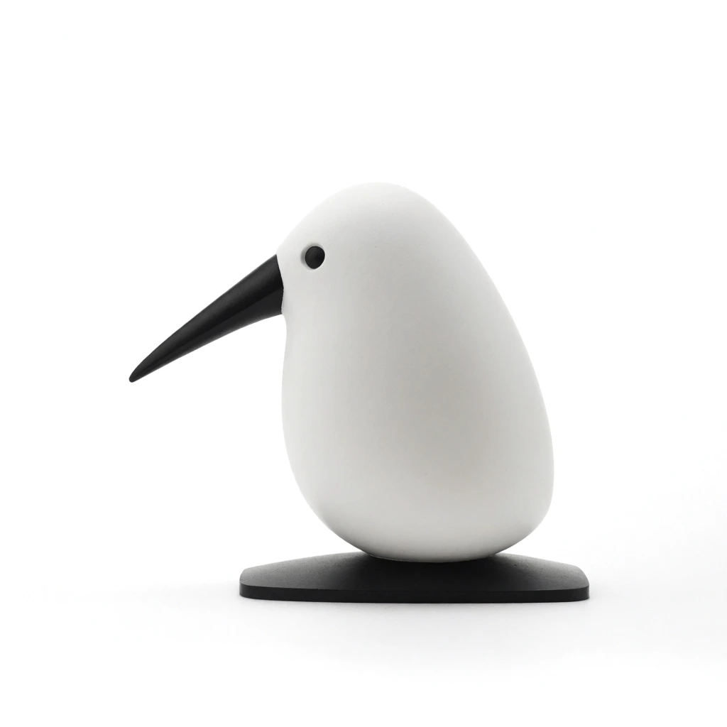 a close-up of a minimalist bird figurine in profile facing left, centered within a high-key studio environment, set against a seamless and stark white infinity background, illuminated by soft diffused wrap-around lighting creating delicate micro-shadows, hyper-sharp focus on smooth material textures, clinical yet premium commercial aesthetic, neutral tonal balance, high-signal digital clarity, zero grain, even exposure, professional e-commerce product photography style.