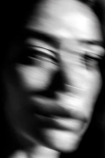 Spectral Motion Noir style reference image — shutter drag effect