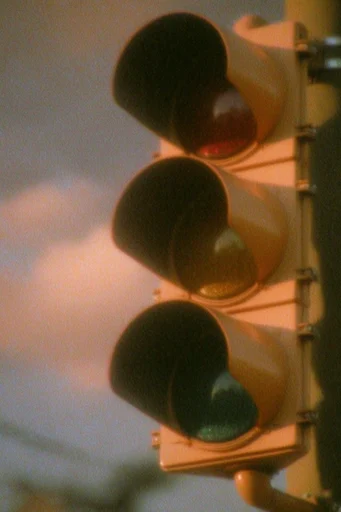 Analog Cinematic Nostalgia style reference image — heavy film grain