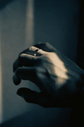 Cinematic Chiaroscuro Solitude style reference image — dramatic shadows