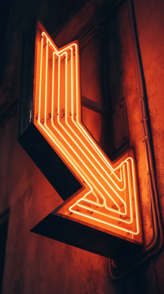 glowing orange arrow-shaped neon sign, diagonal and vertical neon tubes, dark metal casings, warm reddish-orange ambient glow on textured wall, visible conduits, abstract urban geometry, cinematic night lighting