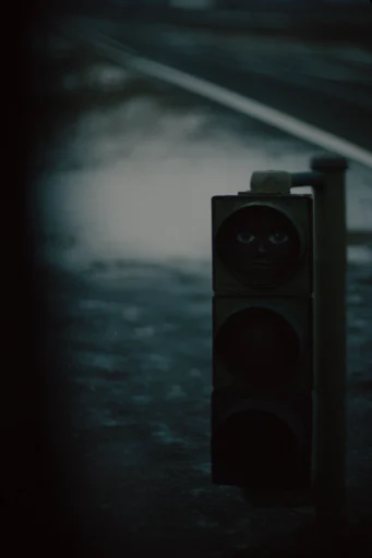 Cold Cinematic Suspense style reference image — low-key atmosphere