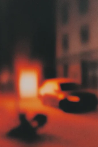 Luminous Noir Silhouette style reference image — heavy analog film grain