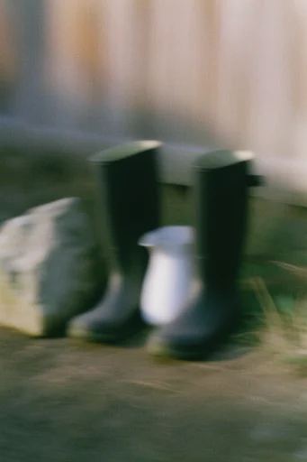 Kinetic Liminal Nostalgia style reference image — cinematic film grain