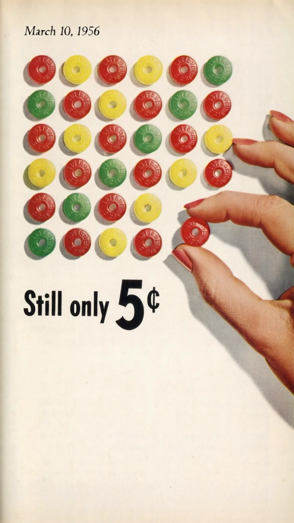 A vintage advertisement depicts a precise grid of red, yellow, and green ring-shaped hard candies on a solid off-white background, with a hand reaching in to pick up a single red piece. The candies are arranged in nine rows and seven columns, though several in the lower right are covered by a fair-skinned right hand entering from the right edge. Each translucent candy is a glossy disc with a central hole, featuring the words "LIFE SAVERS" embossed in a circular pattern on its surface. The hand has long, slender fingers and short fingernails painted with a coral-pink polish, pinching one red candy between the thumb and index finger. In the top left corner, the date "March 10, 1956" is printed in a small, black, serif font. To the left of the pinched candy, black sans-serif text reads "Still only 5¢", where the numeral "5" is larger than the surrounding letters and the cent symbol. The composition uses a flat, top-down perspective and even lighting that emphasizes the saturated colors and smooth textures of the subjects. The overall artistic style is characteristic of mid-century graphic design, featuring a clean layout and a minimalist color palette against a neutral, aged cream backdrop.