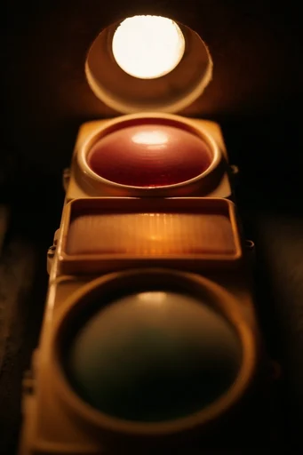 Intimate Amber Chiaroscuro style reference image — golden amber glow