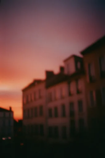 Nostalgic Twilight Solitude style reference image — vintage 35mm film grain