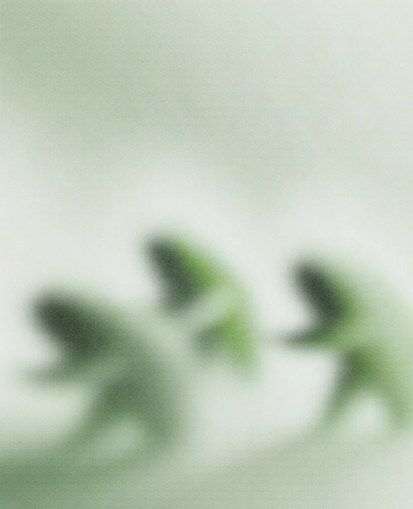 three minimalist food characters rendered as soft-edged blurred silhouettes situated below the text 'character collection' in a clean sans-serif typeface, monochromatic sage green and creamy mint color palette, heavy organic film grain and stippled noise texture throughout, extremely diffuse high-key lighting, ethereal soft-focus aesthetic, airy minimalist composition with ample negative space, tactile analog quality, contemporary brand editorial style.