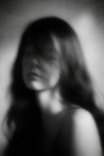Ethereal Noir Pictorialism style reference image — heavy film grain