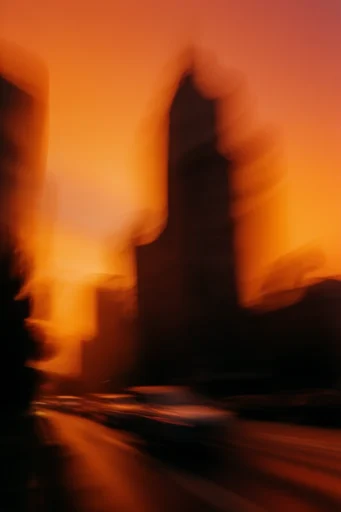 Luminous Amber Silhouette style reference image — dreamy fluid motion