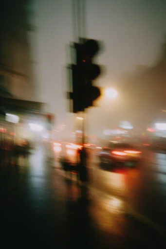 Cinematic Nocturnal Blur style reference image — 35mm film photography