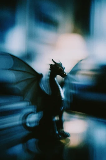 Cinematic Nocturnal Blur style reference image — analog film grain
