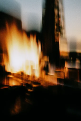 Amber Noir Motion style reference image — analog film grain