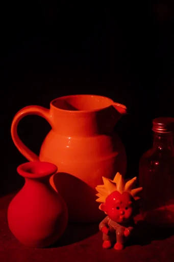 Crimson Noir Graphic style reference image — high-contrast noir lighting