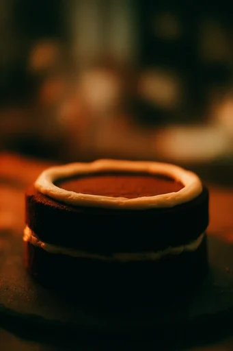 Cinematic Amber Nocturne style reference image — analog film aesthetic