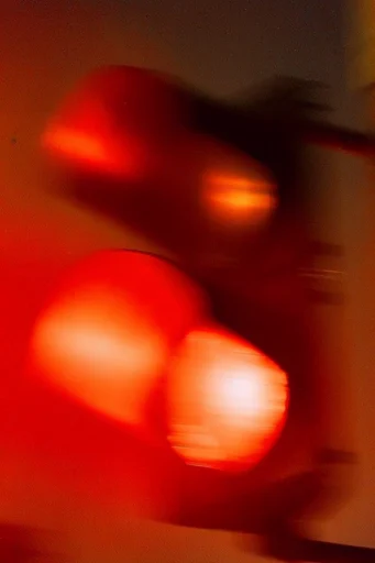 Nocturnal Kinetic Ember style reference image — stark contrast