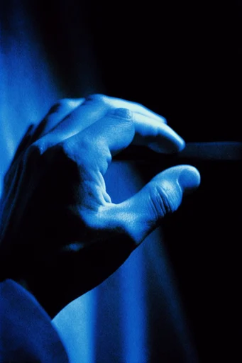 Luminous Cobalt Noir style reference image — pitch black background