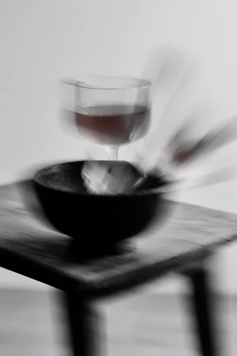 Ethereal Monochrome Kineticism style reference image — intentional camera movement
