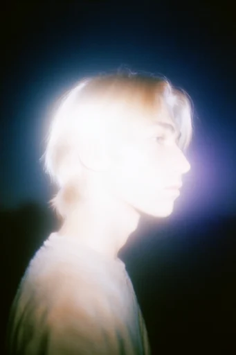 Spectral Nocturnal Noir style reference image — ethereal light bloom