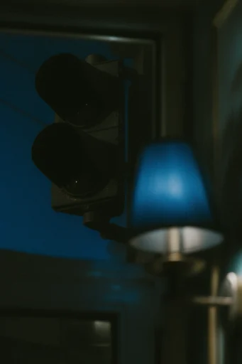 Cinematic Nocturnal Introspection style reference image — deep indigo and teal