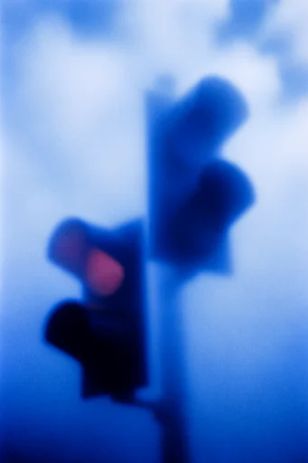 Ethereal Cobalt Grain style reference image — soft-focus ethereal silhouette