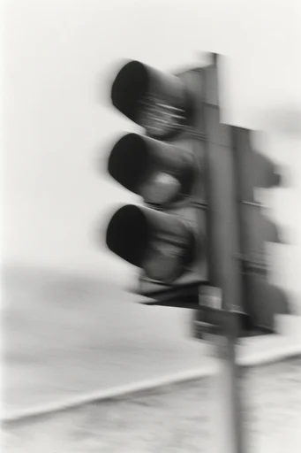 Ethereal Kinetic Monochrome style reference image — motion blur silhouette