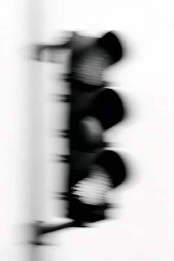 Spectral Motion Noir style reference image — long exposure portrait