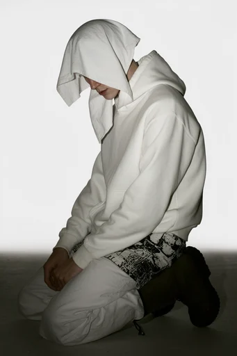 Minimalist Glitch Avant-Garde style reference image — minimalist studio photography