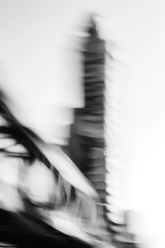 Ethereal Kinetic Monochrome style reference image — fine film grain