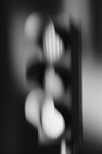 Ethereal Analog Noir style reference image — heavy film grain