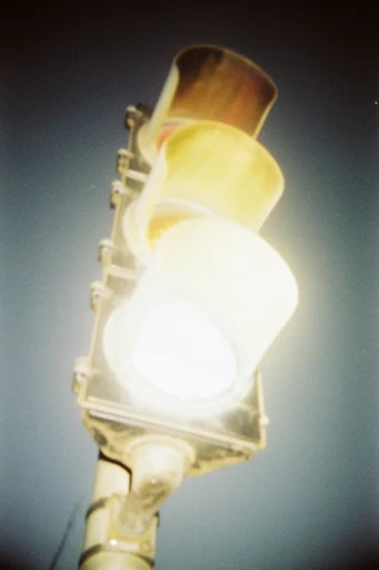 Nostalgic Analog Haze style reference image — warm amber lighting