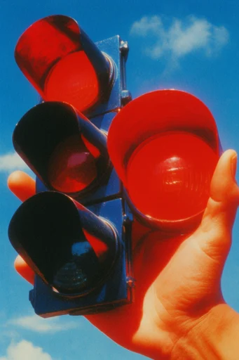 Saturated Retro Surrealism style reference image — saturated primary colors