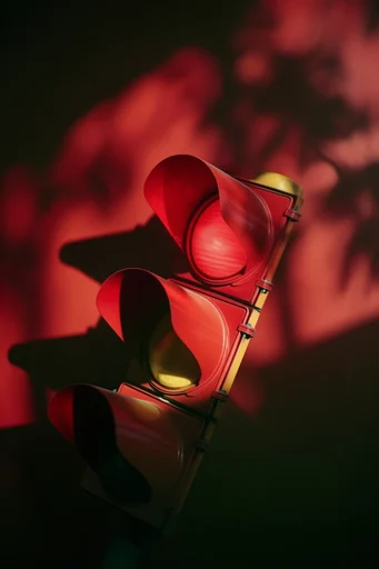 Crimson Noir Minimalist style reference image — chiaroscuro lighting