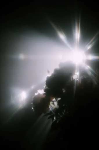 Cinematic Volumetric Noir style reference image — hazy atmospheric lighting